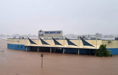 The Taree Aquatic Club during the Mid North Coast and Hunter floods looking toward the severely impacted suburb of Glenthorne on the far bank (Image shared with Risk Frontier's survey team by member of Aquatic Club cleanup staff).